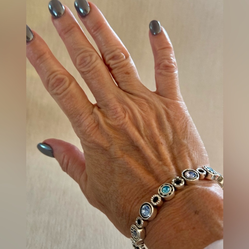 Brighton ‘Halo Burst’ hinged, silver plated with colored Swarovski crystals.